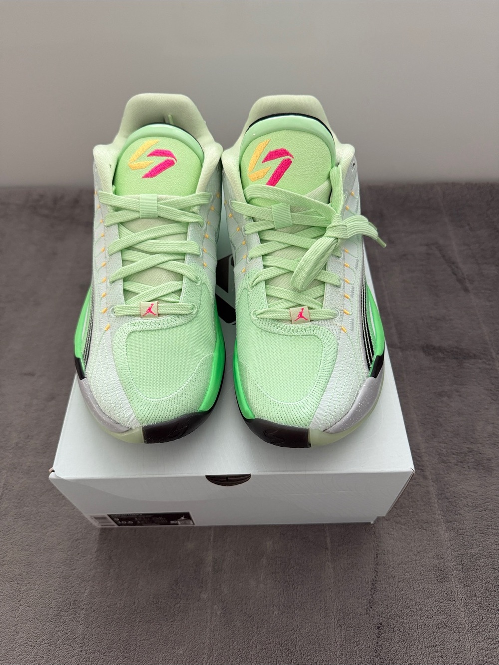 Jordan Women’s Mint Green Sneakers with Pink and Yellow Highlights - Picture 2 of 5